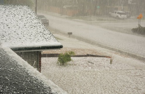 Severe hail storms damage and dent roofing systems