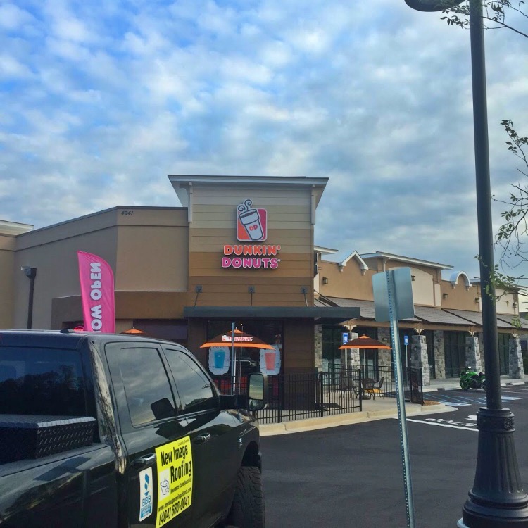 storm damage commercial low slope roof information
