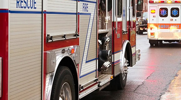 Emergency responders lightning strike damage residential roof