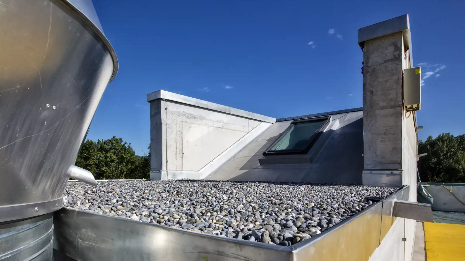 maintenance program rocks stone gravel ballast system low slope membrane roof
