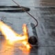 Hot tar or hot mop roofing used a torch down method