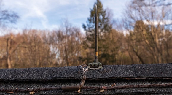 Lightning strike damage protection residential roof