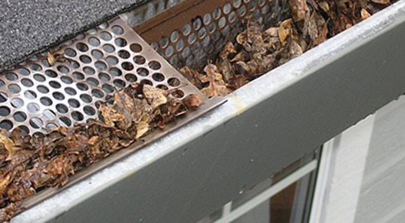 effects of extreme heat on residential roofs clogged gutters