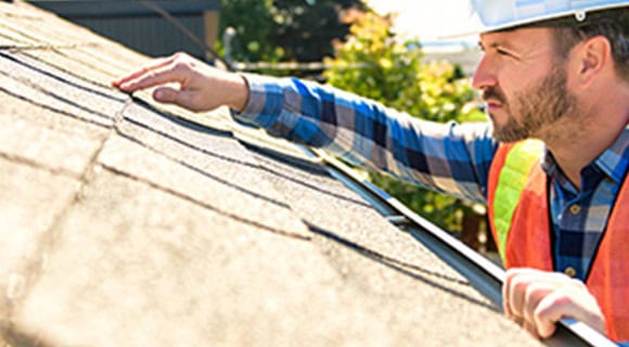 Leaking residential roofing system inspection