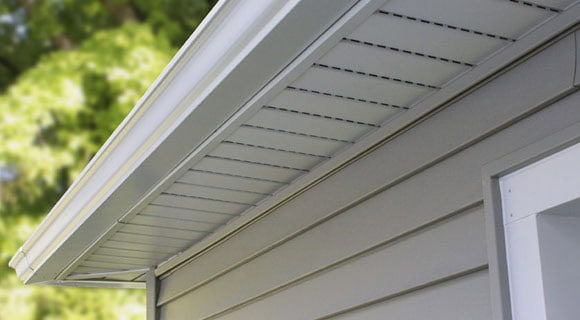 Residential sloped roofing soffit vents