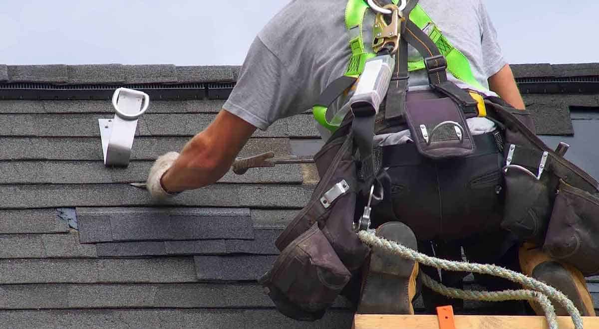 technician installing a residential re roof